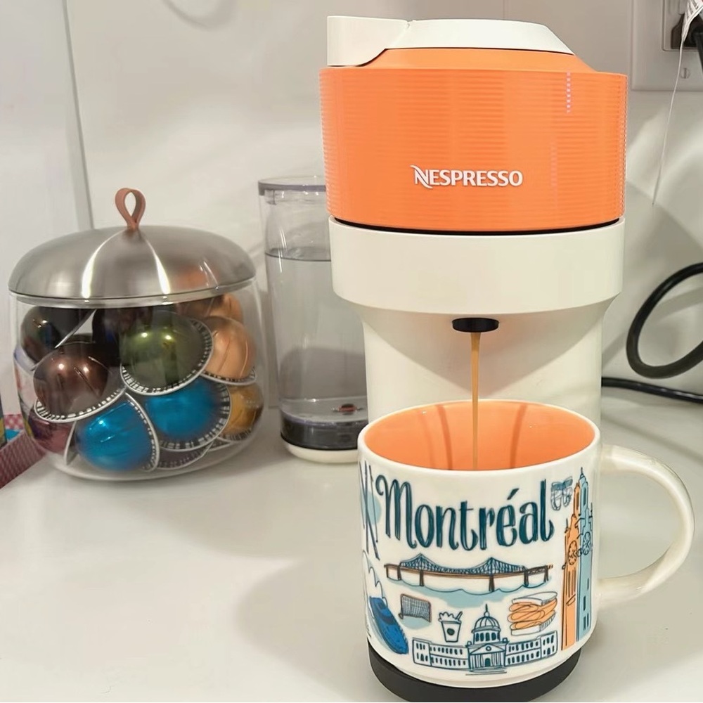 Nespresso Vibrant Orange and White Coffee Maker
